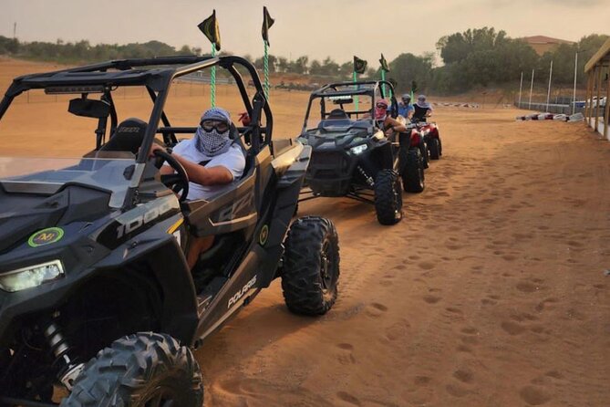 1 Hour Private Self Drive Dune Buggy and Sand boarding in Dubai - Taking the wheel in the Dubai desert