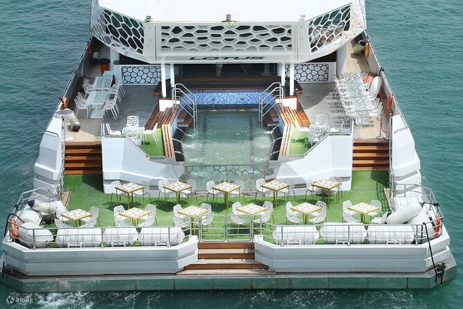 3-Hour Lotus Mega Yacht Dinner Cruise Dubai with Transfers - Sunset turns into Dubai’s night lights