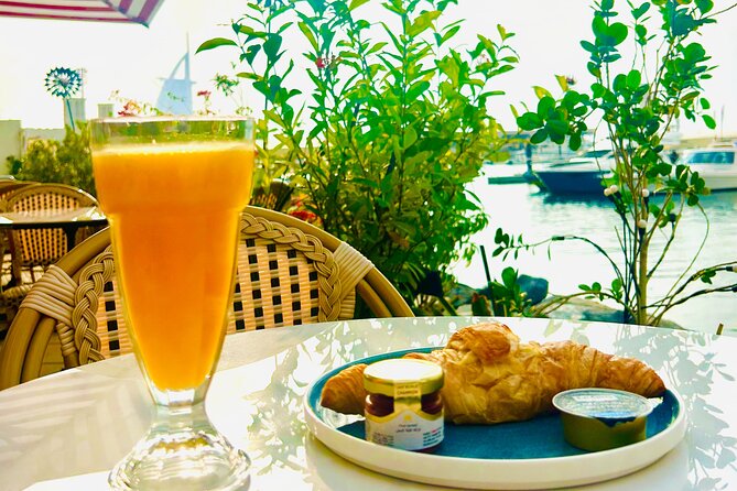 30-Min Jet Ski Tour: English Breakfast, Burj Al Arab View Bliss - Meeting the guide at Umm Suqeim