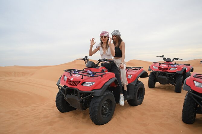 4 Hour Morning Desert Safari with Camel Ride & Sand Boarding - Dune bashing on high red sand