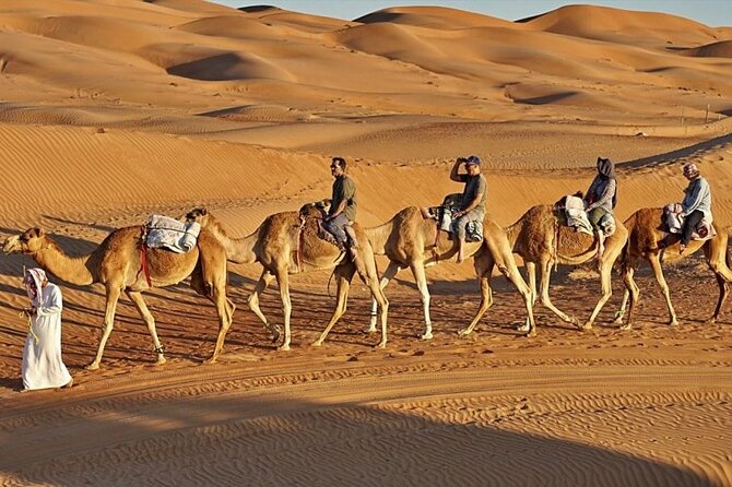 4x4 Arabian Adventure Desert Safari with BBQ Dinner - Arabic coffee, dates, henna, and camp customs