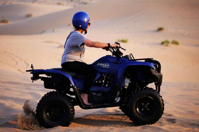 6-Hour Dubai Desert Safari with BBQ Dinner & Quad Biking - Tanoura, belly dancing, and the fire show
