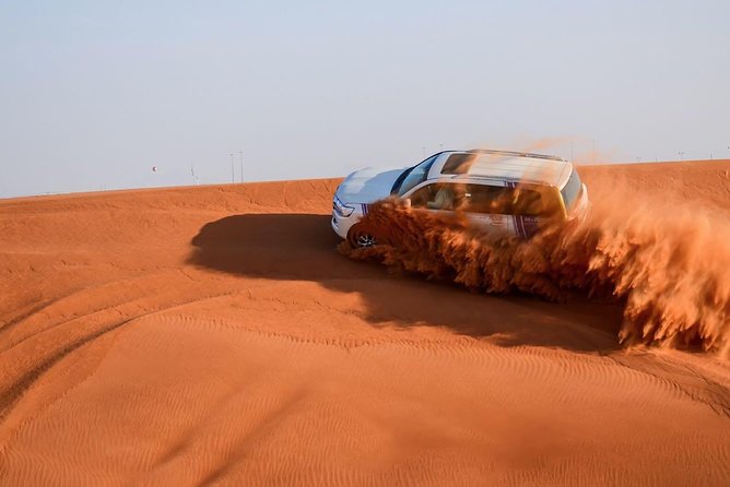 6-Hour Dubai Desert Safari with BBQ Dinner & Quad Biking - Dune bashing is the main event