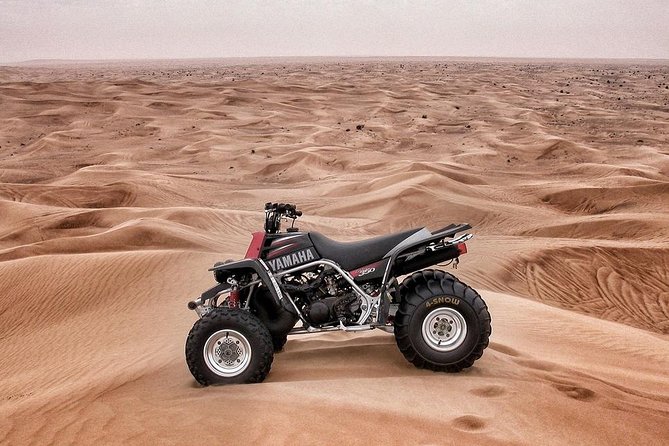 90-Minutes Quad Biking Tour From Dubai - Leaving Dubai for the open sand