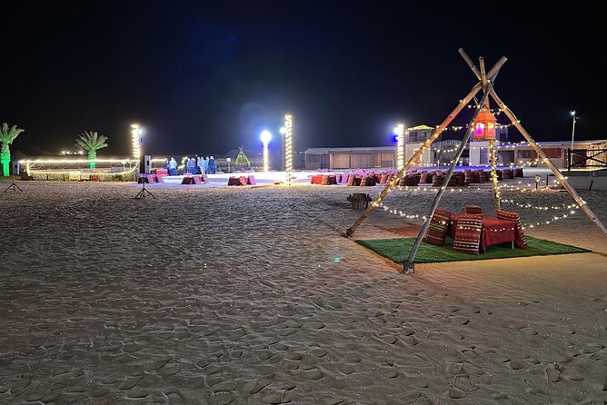 Abu Dhabi: 4-Hour Morning Safari with Camel Ride & Sand boarding - Camel riding near the camp area