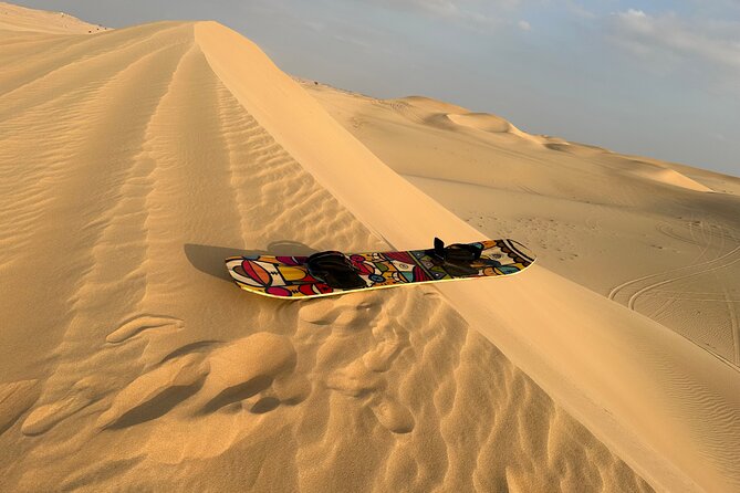 Abu Dhabi: 4x4 Desert Safari and Sandboarding. - Sandboarding and traditional camp time