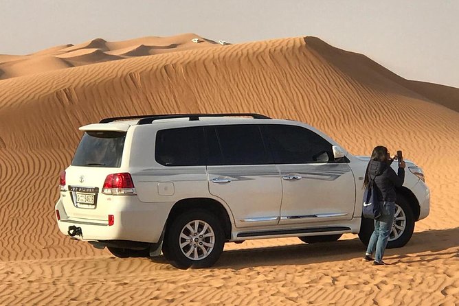 Abu Dhabi 4x4 Desert Safari BBQ Dinner , Camel Ride , Belly Dance - Sandboarding on the red dunes