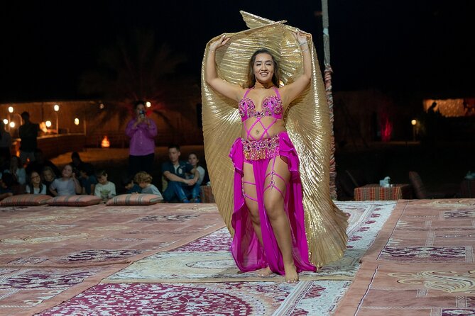 Abu Dhabi: 7-Hours Desert Safari with BBQ, Camel Ride & Sandboarding - A Bedouin-style camp with many short activities