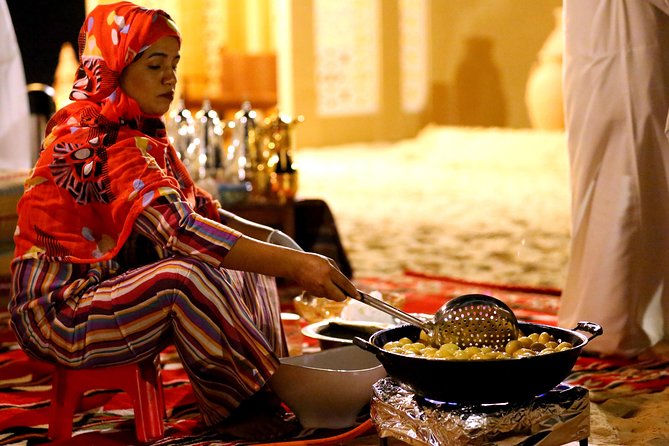 Abu Dhabi Afternoon Desert Safari and BBQ Dinner - Arabic buffet dinner under the evening sky