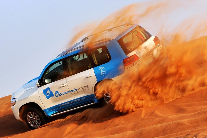 Abu Dhabi: Desert Safari with BBQ, Camel Ride & Sandboarding - Pickup from Abu Dhabi and the ride into the desert