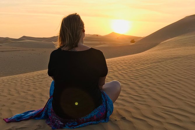 Abu Dhabi Desert safari with BBQ Dinner,Sandboarding & Camel ride - Leaving Abu Dhabi for the open desert