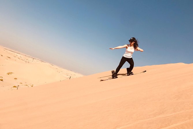 Abu Dhabi Desert safari with BBQ Dinner,Sandboarding & Camel ride - The camel farm and the short camel experience