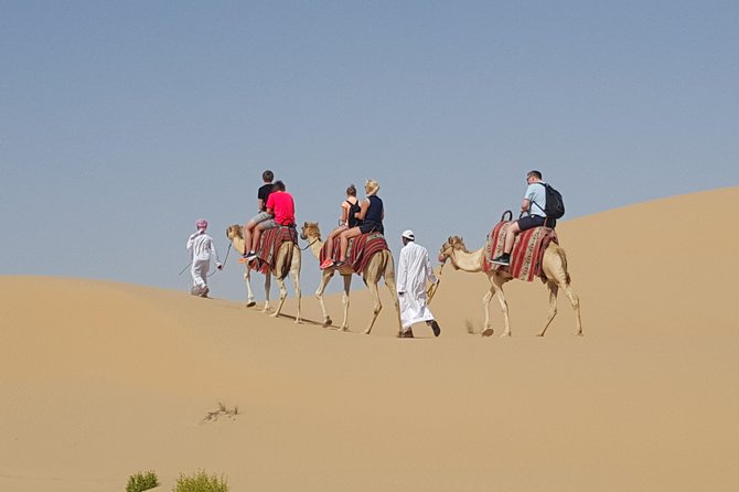Abu Dhabi Desert safari with BBQ Dinner,Sandboarding & Camel ride - Dune bashing across Abu Dhabi’s sands