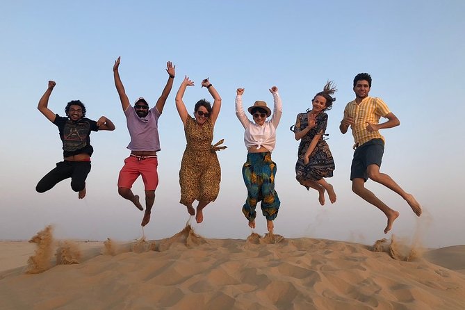 Abu Dhabi Desert Safari with BBQ Dinner & Shows - Dune bashing across the Abu Dhabi sand