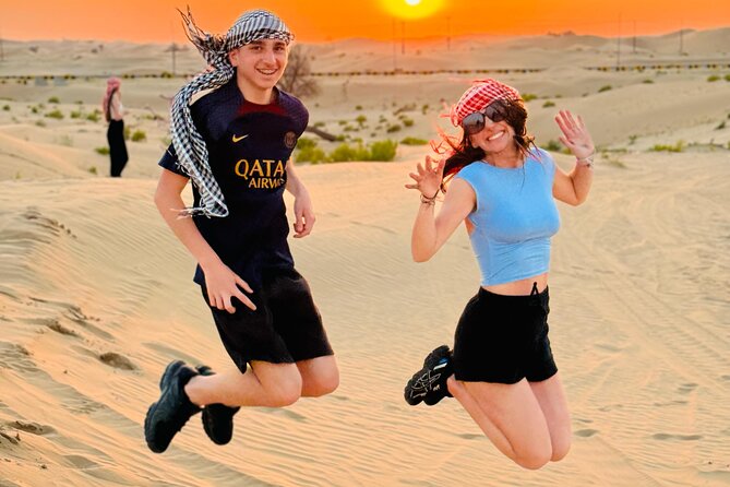 Abu Dhabi Desert Safari with Live Entertainment and Live BBQ - From Abu Dhabi streets to open sand
