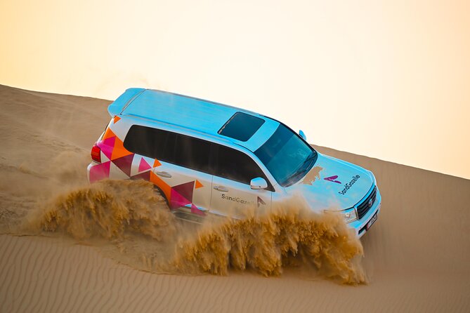 Abu Dhabi Evening Desert Safari - Dune bashing Camel ride and BBQ - Optional quad biking and what costs extra