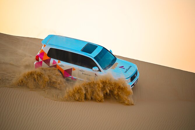 Abu Dhabi Evening Desert Safari - Private car Dune bashing & BBQ - Sand boarding and the camel farm stop