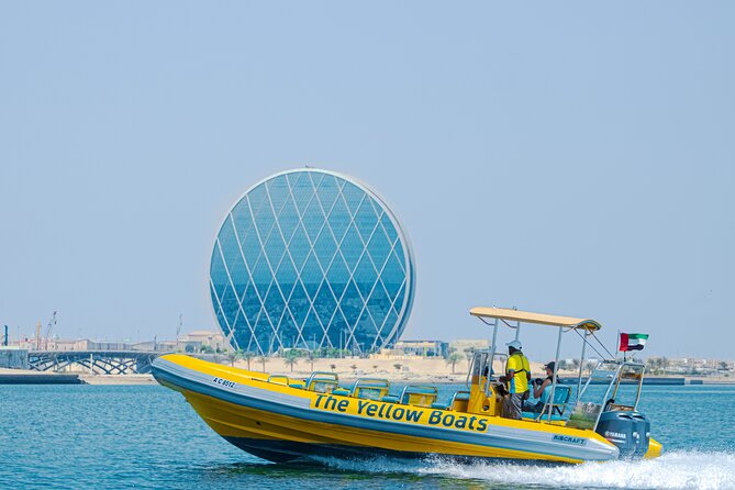 Abu Dhabi Guided Sightseeing Boat Tours - Guides, photographs, and the human side of the ride