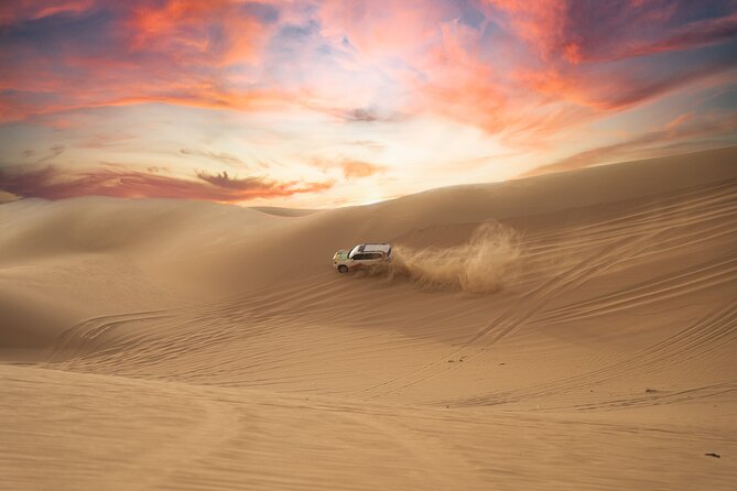 Abu Dhabi Morning Desert Safari: 4x4 Dune Bashing, Camel Ride and Sandboarding - Guides, Group Size, and Service