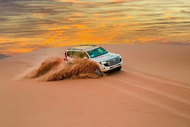 Abu Dhabi Morning Desert Safari: 4x4 Dune Bashing, Camel Ride and Sandboarding - The Camel Farm and Short Camel Ride