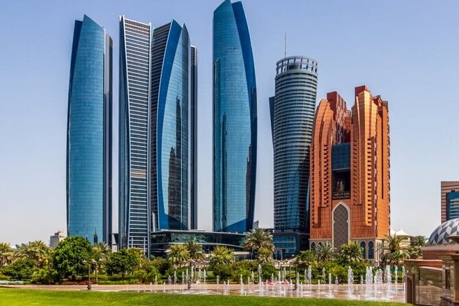 Abu Dhabi Tour in Private 4x4 with Grand Mosque, Louvre & Ferrari - Ferrari World or Warner Bros. on Yas Island