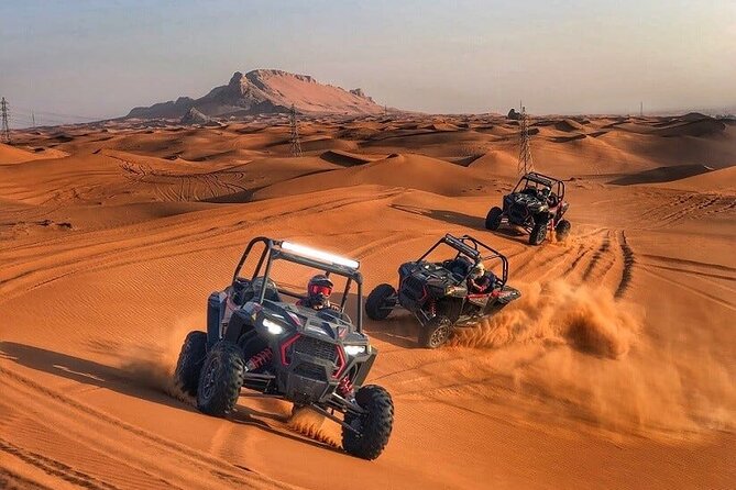 Adventurous Red Dune Desert Safari Deal with Quad Bike,Shows &BBQ - Dune bashing across the sand