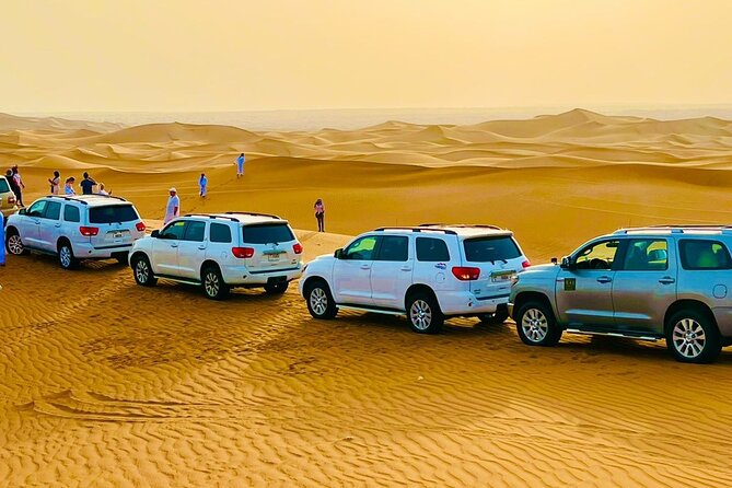 Afternoon Desert Safari with Quad Bike, Camel Ride and Sandboarding - Red dunes and a four-hour desert plan