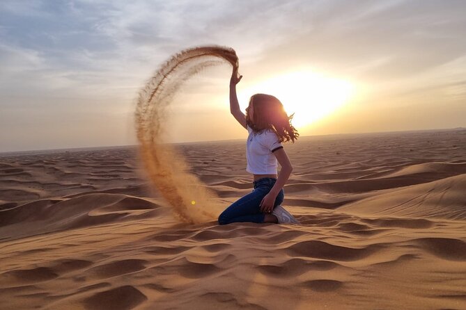 Afternoon Desert Safari with Quad Bike, Camel Ride and Sandboarding - Dune bashing across the high red dunes