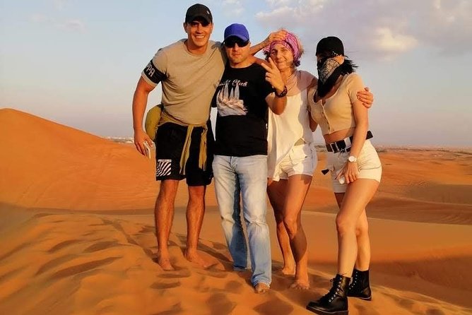 Afternoon Dune Drive Safari with SunSet Photo & Sand Boarding - Sandboarding on the red dunes