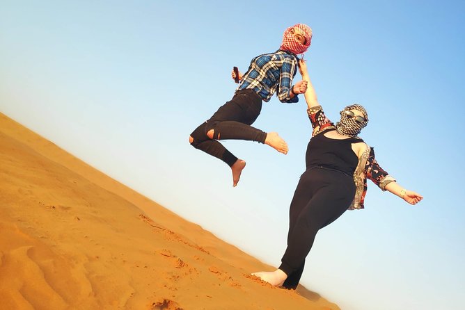 Afternoon Dune Drive Safari with SunSet Photo & Sand Boarding - Sunset at Al Madam