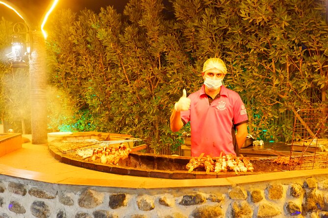 Al Madam Red Sand Safari with BBQ Dinner & Traditional Show - Sandboarding and the short camel ride