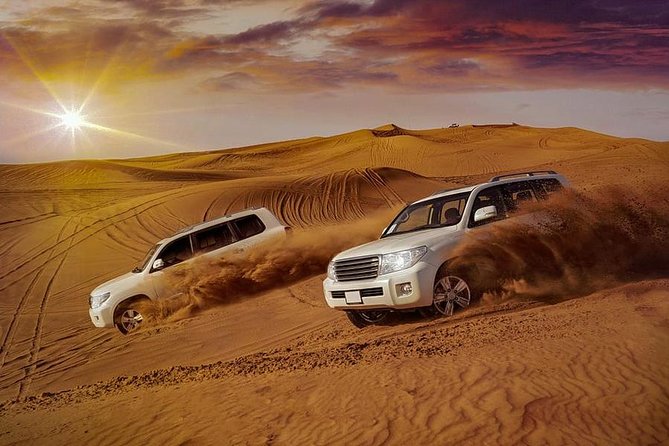 Arabian Desert Safari with BBQ Dinner Camel Ride, Sand Boarding - Jannat Desert Safari Camp after dark