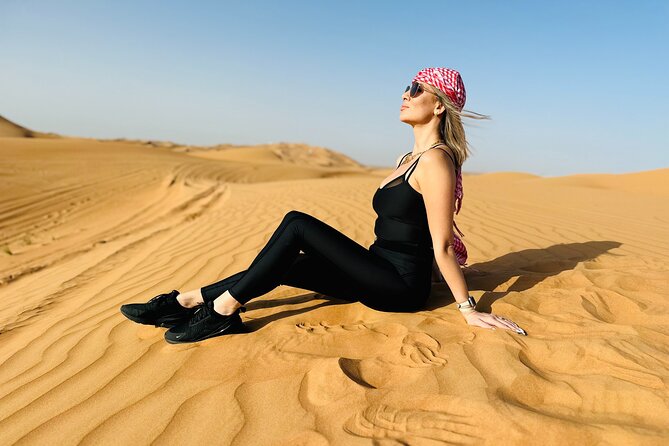 Best Dubai Desert Safari with Buffet Dinner,Sand Boarding & Shows - Dinner, drinks, and three stage shows