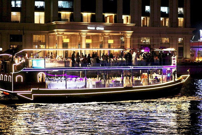 Buffet Dinner Cruise on New Dubai Canal - Boarding a wooden dhow on modern Dubai water
