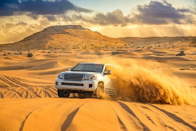 Camel Trekking Dubai with Dune Bashing and Sand Boarding - Starting at 7:00 a.m. in the Dubai desert