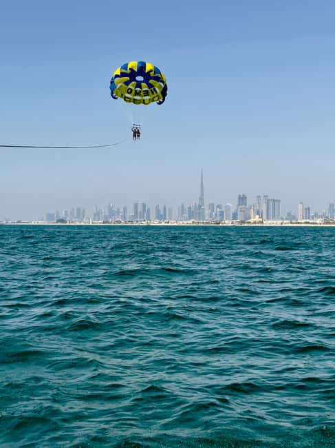Combo: 30-Min Jet Ski to Burj Al Arab & Solo Parasailing - Riding toward the Burj Al Arab