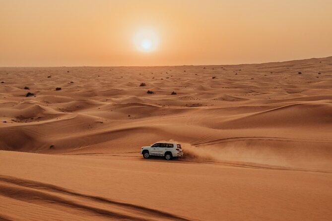 Combo:Deluxe Desert Safari with dinner + ATV self-drive/Quad Bike - Arabic coffee, dates, and a camp with plenty to do