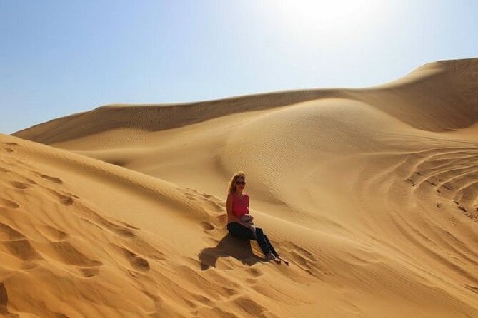 Desert Safari and Quad Bike Experience in Dubai with Dinner - Sandboarding, camels, and desert photo time