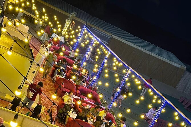 Desert Safari BBQ Dinner, Live Shows, ATV Bikes, Sandboarding - Camel riding, coffee, dates, and traditional touches