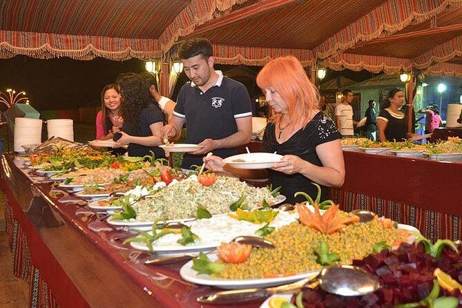 Desert Safari Dubai Experience with Dinner - Sandboarding and a short camel ride