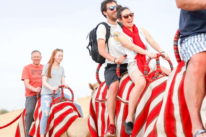 Desert Safari Dubai Luxury Tour - Camel riding, sandboarding, and camp activities