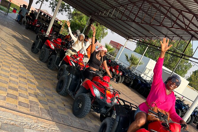 Desert Safari Dubai & Quad Bike with Dinner - Camel riding and sandboarding slow the pace