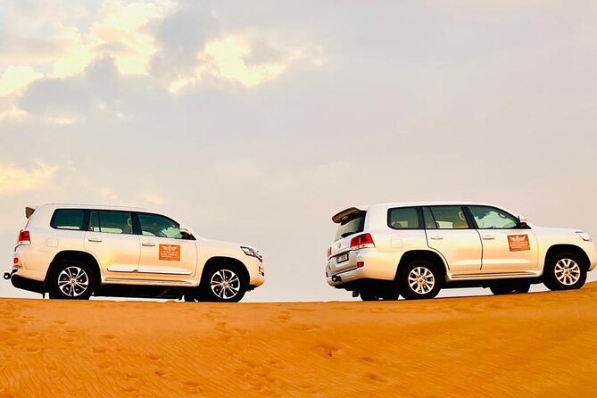 Desert Safari Dubai with BBQ Dinner & Camel Ride - Sandboarding adds a simple burst of fun