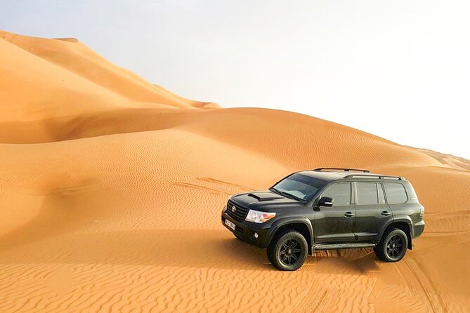 Desert Safari Dubai with BBQ - dinner, Sandboarding - Red dunes, dune bashing, and a long desert afternoon