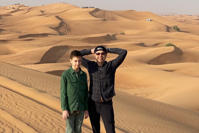 Desert Safari Dubai with BBQ - dinner, Sandboarding - Tanoura, belly dancing, and fire performances