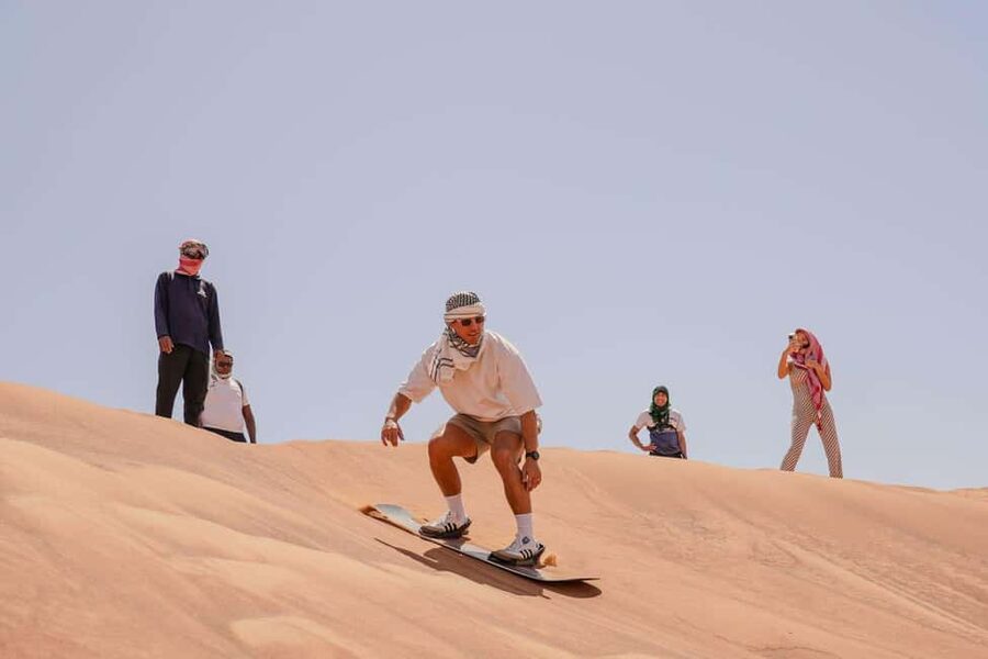 Desert Safari Dubai with Camel Ride, Sandboarding & Dinner - From city traffic to Lahbab’s high dunes