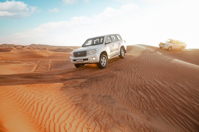 Desert Safari Dubai with Dune Bashing, Sandboarding, Camel Ride, 5 Shows, Dinner - The Bedouin-style camp and included extras