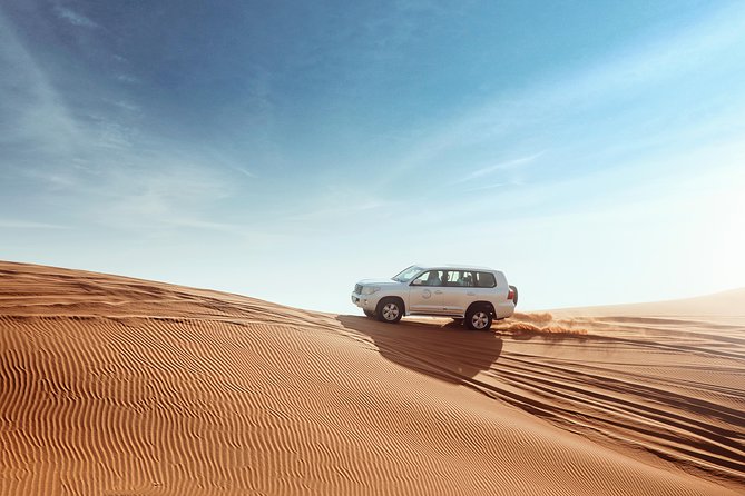 Desert Safari Dubai with Dune Bashing, Sandboarding, Camel Ride, 5 Shows, Dinner - Four shows listed, five shows advertised
