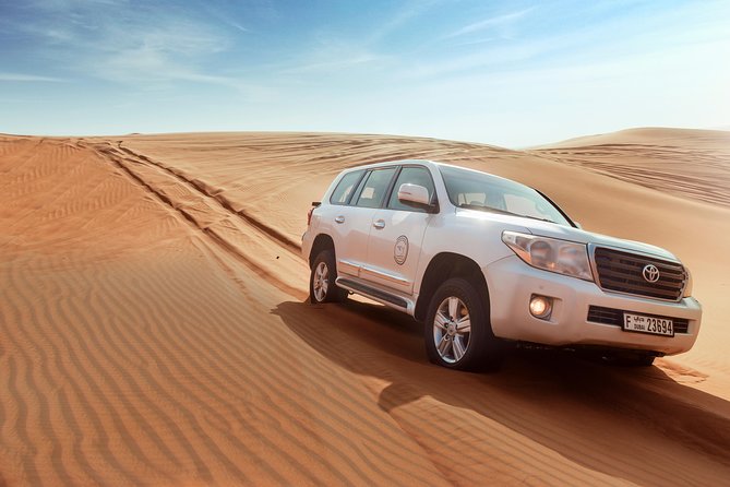 Desert Safari Dubai with Dune Bashing, Sandboarding, Camel Ride, 5 Shows, Dinner - BBQ dinner with vegetarian and non-vegetarian choices