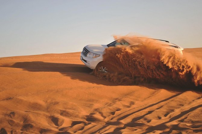 Desert Safari Experience 4×4 Pick and Drop from Abu Dhabi - Dune bashing across the Abu Dhabi sands